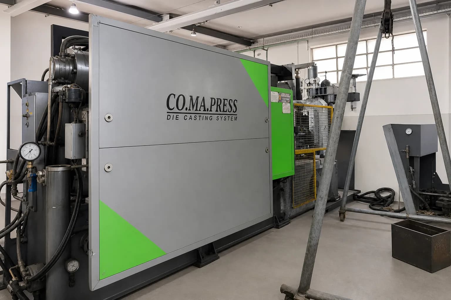 CO.MA.PRESS die casting system branded panel